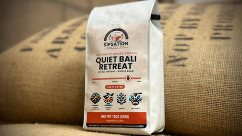Coffee bag labeled 'Quiet Bali Retreat' by Sipstation on a burlap background